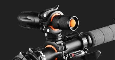 Black bike phone holder with handlebar clamp and rotating 360° mount, orange accents
