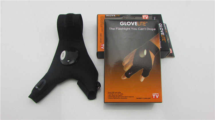 Black LED flashlight glove set in retail packaging with instruction card