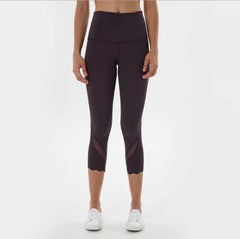 Deep purple high-waist cropped sports leggings with sheer side panel