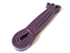 Purple latex resistance loop band, stacked loops with tied center strap