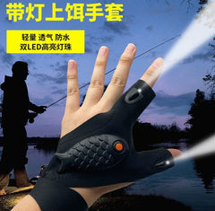 Black LED flashlight gloves with orange LED light on palm module
