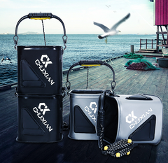 Two collapsible fishing water buckets, black and gray, with carry handles and front logo