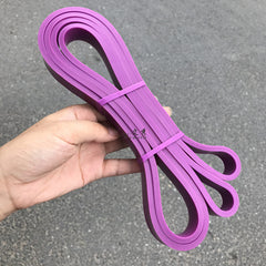 Purple latex resistance loop band, multi-loop pull-up band held in hand