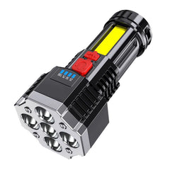 Black portable LED flashlight with silver base and multiple front bulbs, red button