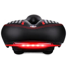 Black bike saddle with red safety light strip and neon dotted accents