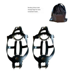 Metal and black ice cleat pair with front traction spikes and straps