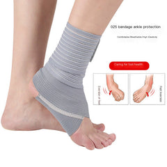 Gray breathable ankle support wrap with elastic bands, worn on an ankle and foot.