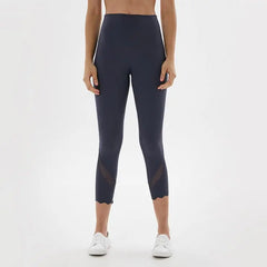 Navy high-waist cropped sports leggings with sheer side panel