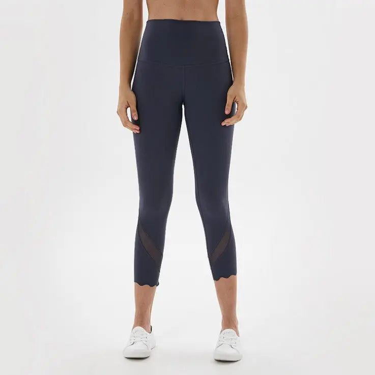 Navy high-waist cropped sports leggings with sheer side panel