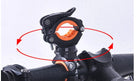 Black bike light mounting bracket with orange inner rings on handlebar