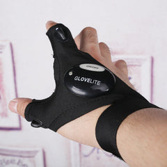 Black LED flashlight glove with oval ON/OFF control and light housing on palm