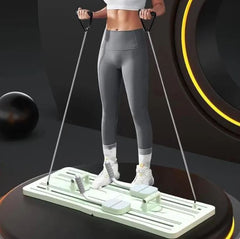 Woman using compact Pilates sliding board with rope handles while standing
