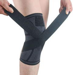 Black removable knee brace with cross wrap strap and contoured padding panel
