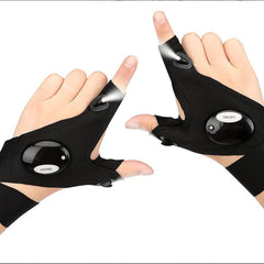Black LED flashlight gloves shown on two open hands with palm lighting modules