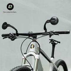 Round bicycle rearview mirror mounted on handlebars