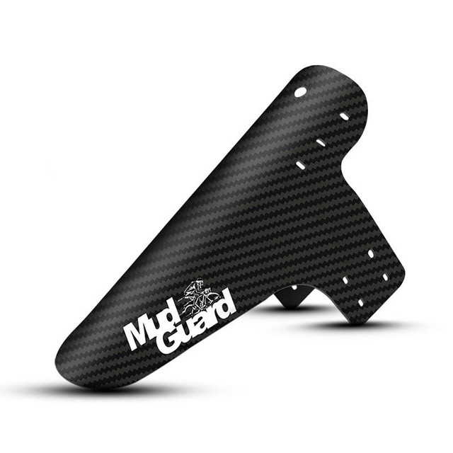 Carbon fiber mudguard with MXGuard logo and mounting holes, angled side view
