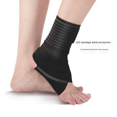 Black breathable ankle support wrap with elastic compression bands on an ankle.