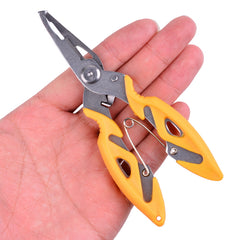 Fishing hook remover pliers held in hand, yellow grips and silver jaws
