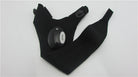 Pair of black LED flashlight gloves laid flat with round light module