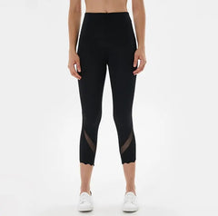 Black high-waist cropped sports leggings with sheer side panel
