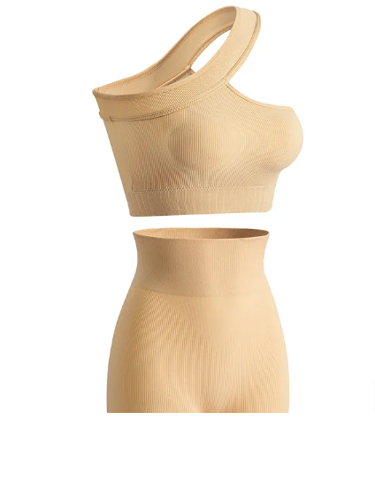 Women's off-shoulder workout suit worn for gym and yoga